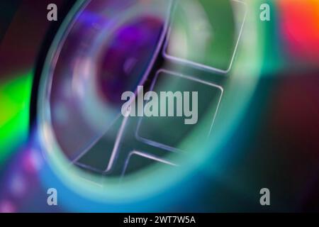 Light and colors reflected on a compact disc Stock Photo
