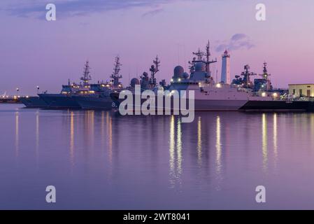 KRONSTADT, RUSSIA - JULY 27, 2019: Russian warships in the Middle Harbor at July twilight Stock Photo