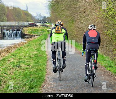 Glasgow, Scotland, UK. 16th March, 2024: UK Weather:   Sunny spring weather in the city on the tow path of the forth and clyde canal. Credit Gerard Ferry/Alamy Live News Stock Photo