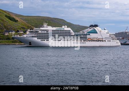 Honningsvag, Norway - 15 July 2023: Seabourn Ovation cruise ship in Honningsvag village in the north of Norway Stock Photo