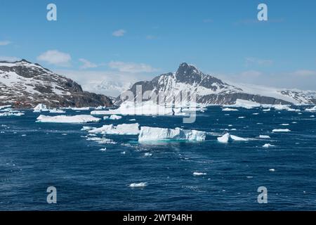 Antarctica mountain landscape with floating ice on the sea. Stock Photo