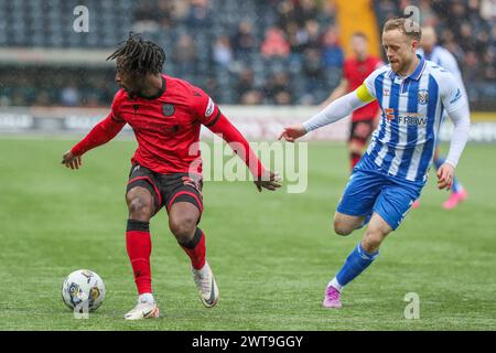 Kilmarnock, UK. 16th Mar, 2024. Kilmarnock FC played St Mirren FC at Rugby Park, Kilmarnock, Ayrshire, Scotland, UK in an important Scottish Premiership match. The final score was Kilmarnock 5 - 2 St Mirren. The scorers for Kilmarnock were Kyle Vassell (Kilmarnock 9) 61 mins and 73 mins, Daniel Armstrong (Kilmarnock 11) 65 mins, penalty, Marley Watkins (Kilmarnock 23) 68 mins and Daniel Watson (Kilmarnock 12) 79 mins. The scorers for St Mirren were Charles Dunne (St Mirren 18) 20 mins and Mikael Mandron (St Mirren 9) 39 mins. Credit: Findlay/Alamy Live News Stock Photo