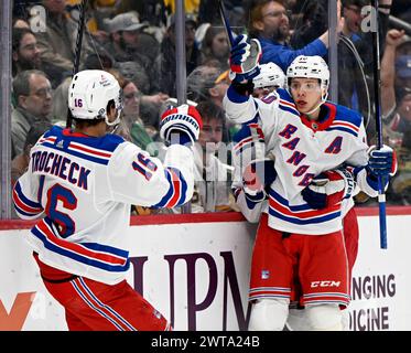 Pittsburgh, United States. 16th Mar, 2024. New York Rangers left wing Artemi Panarin (10) celebrates his goal with New York Rangers center Vincent Trocheck (16) during the first period at PPG Paints Arena in Pittsburgh on Saturday, March 16, 2024. Photo by Archie Carpenter/UPI. Credit: UPI/Alamy Live News Stock Photo