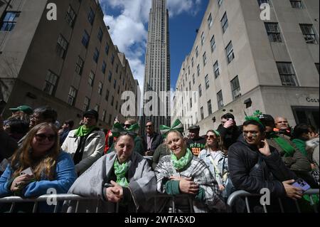 New York, USA. 16th Mar, 2024. Sister Amanda Healy and Lisa Richardson from London watch the 263rd Annual St. Patrick's Day Parade along Fifth Avenue, New York, NY, March 16, 2024. (Photo by Anthony Behar/Sipa USA) Credit: Sipa USA/Alamy Live News Stock Photo