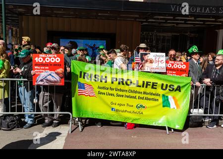 New York, NY, USA. 16th Mar, 2024. Irish-American contingents kicked off New York's St. Patrick's Day Parade to the tunes of numerous pipe bands, and cheered on by throngs of spectators, many bedecked in green. Irish Pro-Life USA anti-abortion protesters. Credit: Ed Lefkowicz/Alamy Live News Stock Photo