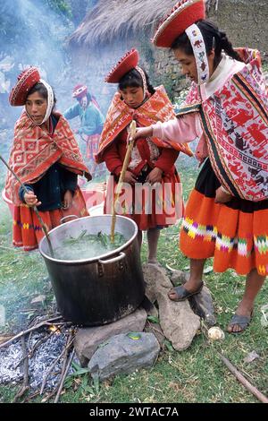 Willoq, Urubamba Valley, Peru.   Quechua Women Making Dye for Fabrics. Stock Photo