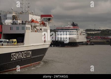 Isle of Man Steam Packet Company vessel Ben-My-Chree arriving in at Heysham Port, Lancashire alongside the new Manxman ferry. Stock Photo