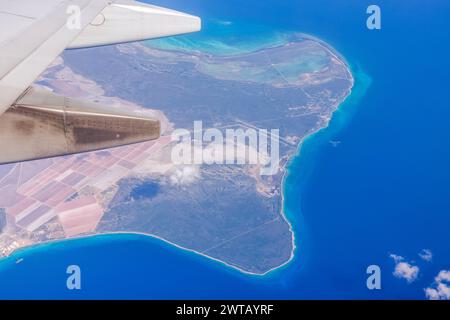 Beautiful view from the airplane window of the blue coastal waters of the Atlantic Ocean near the city of Miami. Stock Photo