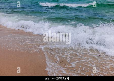 Gorgeous sight of Atlantic Ocean waves gently rolling onto the sandy shores of Miami Beach, USA. Stock Photo