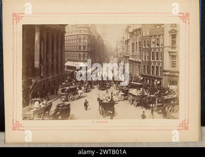 Cheapside. London Stereoscopic and Photographic Company, photographer (founded 1854, dissolved 1922) about 1890 View of the intersection of Queen Victoria St., Cheapside and Poultry, and Mansion House St. looking down Cheapside and Poultry from the Royal Exchange. The busy intersection is teeming with pedestrians and horse-drawn carriages, who move around the streets in all directions. Mansion House sits on the left side of the image in the foreground. (Recto, image) lower left, handwritten in the negative: "776 MANSION HOUSE St.[superscript]"; (Recto, mount) lower center, printed in red ink: Stock Photo