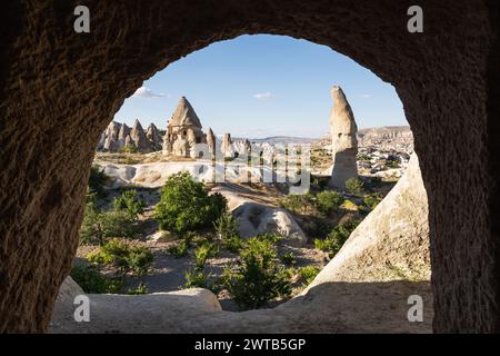 Fairy chimney valley in Cappadocia, Turkey. Framed view from inside the cave Stock Photo