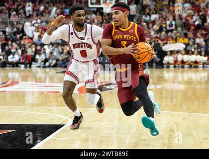 MAR 16 2024: Iowa State Cyclones guard Tamin Lipsey (3) drives to the basket against Houston Cougars guard Mylik Wilson (8) in the Big 12 Tournament Finals at the T-Mobile center, Kansas City, Missouri. Jon Robichaud/CSM. Stock Photo