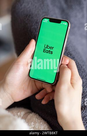 Japan. 17th Mar, 2024. In this photo illustration, the Uber Eats app seen displayed on a mobile phone. Uber Eats started using self-driving robots for delivering food orders to customers in Tokyo in March 2024. (Photo by Stanislav Kogiku/SOPA Images/Sipa USA) *** Strictly for editorial news purposes only *** Credit: Sipa USA/Alamy Live News Stock Photo