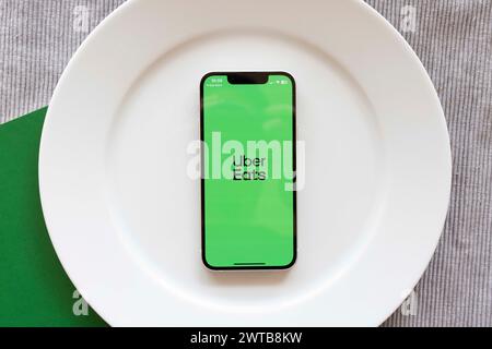 Japan. 17th Mar, 2024. In this photo illustration, the Uber Eats app seen displayed on a mobile phone. Uber Eats started using self-driving robots for delivering food orders to customers in Tokyo in March 2024. (Photo by Stanislav Kogiku/SOPA Images/Sipa USA) *** Strictly for editorial news purposes only *** Credit: Sipa USA/Alamy Live News Stock Photo