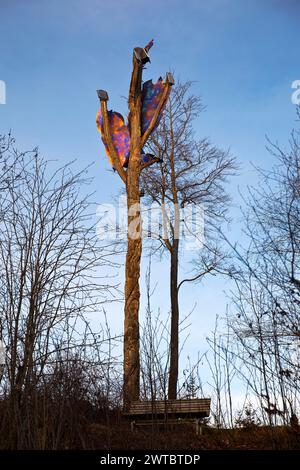 Fire oak artwork by Juergen Suberg in the Elleringhausen nature reserve, Olsberg, Rothaarsteig, Sauerland, Germany Stock Photo