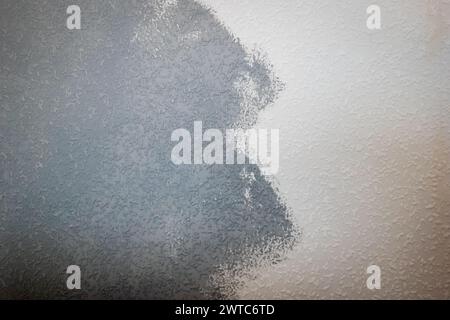 grey painted woodchip wallpaper texture pattern backgroung. Stock Photo