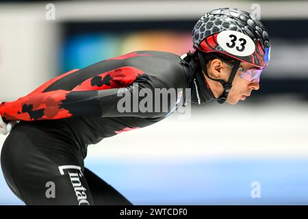 DANDJINOU William CAN in the mens relay competing on day 2 during the World Short Track Speed Skating Championship from Rotterdam on 16 March 2024. Photo by Phil Hutchinson. Editorial use only, license required for commercial use. No use in betting, games or a single club/league/player publications. Credit: UK Sports Pics Ltd/Alamy Live News Stock Photo