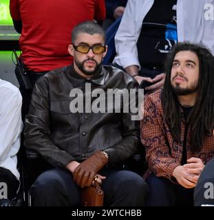 Los Angeles, United States. 16th Mar, 2024. Bad Bunny sits court side during the Los Angeles Lakers/Golden State Warriors NBA game at Crypto.com Arena in Los Angeles on Saturday, March 16, 2024. Photo by Jim Ruymen/UPI Credit: UPI/Alamy Live News Stock Photo