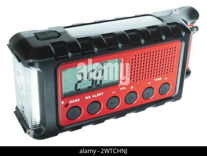 Handy weather radio unit for a disasters that runs on battery power, but has a solar cell and hand crank for if the power goes down, plus a flashlight Stock Photo