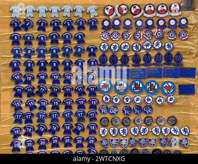 Chelsea pin badges for sale ahead of the Emirates FA Cup quarter-final match at Stamford Bridge, London. Picture date: Sunday March 17, 2024. Stock Photo