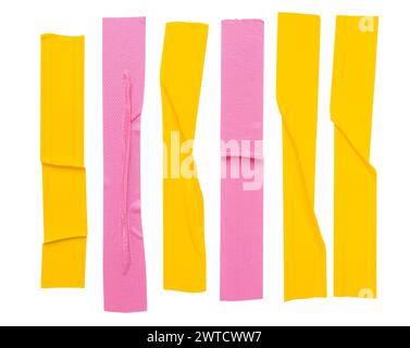 Top view set of pink and yellow wrinkled adhesive vinyl tape or cloth tape in stripes shape is isolated on white background with clipping path. Stock Photo