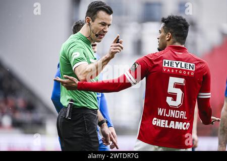 Antwerp, Belgium. 17th Mar, 2024. referee Bram Van Driessche and Antwerp's Owen Wijndal pictured during a soccer match between Royal Antwerp FC and Royal Union Saint-Gilloise, Sunday 17 March 2024 in Antwerp, on the last day (30 out of 30) of the 2023-2024 season of the 'Jupiler Pro League' first division of the Belgian championship. BELGA PHOTO TOM GOYVAERTS Credit: Belga News Agency/Alamy Live News Stock Photo