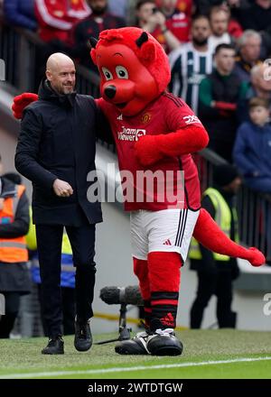 Manchester, UK. 17th Mar, 2024. Erik ten Hag manager of Manchester United with Fred the red mascot during The FA Cup Quarter Final match at Old Trafford, Manchester. Picture: Andrew Yates/Sportimage Credit: Sportimage Ltd/Alamy Live News Stock Photo