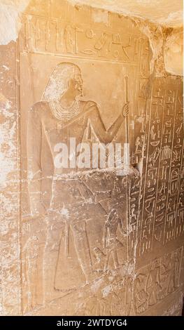 Egypt, Saqqara, near Unas causeway, ruins of the Iy mastaba : Iy and his son Iarty. Stock Photo