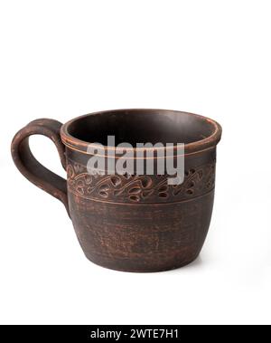 Ceramic cup with handmade ornament. Cup isolated on white background. High quality photo Stock Photo