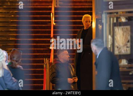 Berlin, Germany. 17th Mar, 2024. Yulia Navalnaya (M), widow of Alexei Navalny, leaves the Russian embassy after casting her vote in the presidential election. Credit: Monika Skolimowska/dpa/Alamy Live News Stock Photo