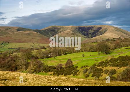 Brant Fell, Langdale Fell and The Calf from A684 viewpoint on Longstone Fell. Hill farms dot the valley and sheep graze beside iconic dry stone walls Stock Photo