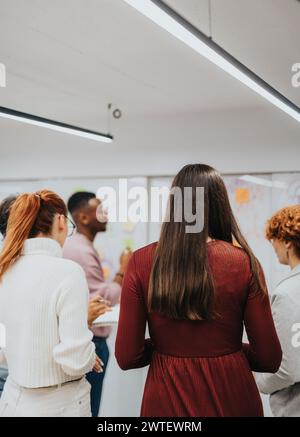 Multiracial colleagues collaborating in a creative corporate office Stock Photo