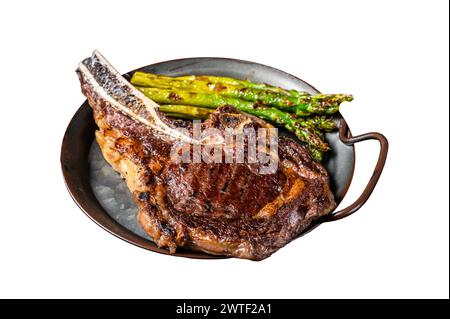 BBQ Grilled Tomahawk or Cowboy with bone beef steak, roasted asparagus. Isolated on white background. Top view Stock Photo