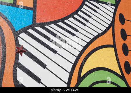 Th wall art show a piano as part of the artwork. Stock Photo