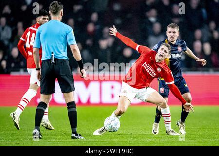 EINDHOVEN, Netherlands. 17th Mar, 2024. football, Philips stadium, Dutch eredivisie, season 2023/2024, during the match PSV - Twente, PSV player Guus Til, FC Twente player Michal Sadilek Credit: Pro Shots/Alamy Live News Stock Photo