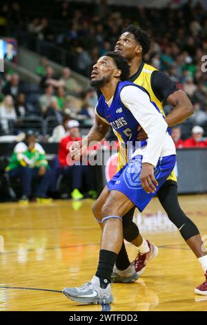 London, Canada. 17th Mar, 2024. London Ontario Canada. March 17 2024, The London Lightning defeat the Kitchener Titans 118-114 in regulation on St. Patrick's Day. Jaquan Lightfoot (5) of Kitchener Titans fights for position. Credit: Luke Durda/Alamy Live News Stock Photo