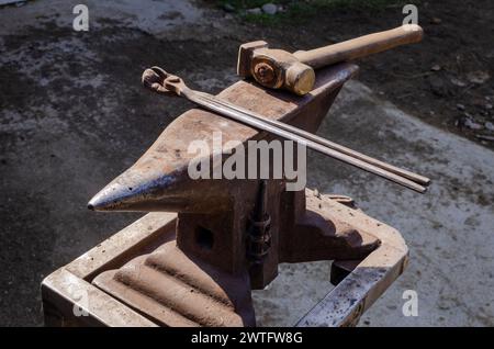 the blacksmith's anvil and tools, iron work, horseshoes, file pliers, hand tools Stock Photo