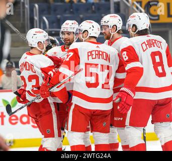 Pittsburgh, United States. 17th Mar, 2024. Detroit Red Wings left wing Lucas Raymond (23) (far left) celebrates his goal during the first period against the Pittsburgh Penguins at PPG Paints Arena in Pittsburgh on Sunday, March 17, 2024. Photo by Archie Carpenter/UPI. Credit: UPI/Alamy Live News Stock Photo