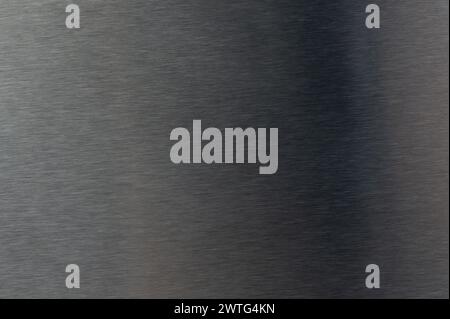 Texture of brushed black metal surface macro close up view Stock Photo