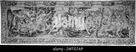 Battle of Romans and Sabines. unknown c. 1550-1575 Tapestry Dimensions: H 5'7' x W 17'5' Tapestry Materials/Techniques: unknown Culture: Flemish Weaving Center: Brussels Ownership History: French & Co. purchased from Lionel Harris, invoiced 12/7/1928; sold to Charles Cudlip Association 5/27/1966. Frieze-like scene with Roman soldiers armed with shields, lances & swords (L of tree); Sabine soldiers on horseback assaulted by Romans (R of tree) (BRD) strapwork with bunches of flowers & fruit, framed by narrow border of abstract flower motif; (L & R BRD) male figure sits in swing; (UPR BRD) bunche Stock Photo