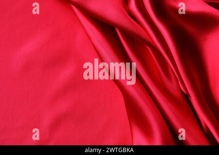 Ripples in red silk fabric Stock Photo