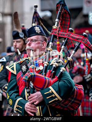 Montreal, Canada. 17th Mar, 2024. People participate in a parade to celebrate the St. Patrick's Day in Montreal, Canada, March 17, 2024. St. Patrick's Day is widely celebrated by Irish communities around the world. Credit: Andrew Soong/Xinhua/Alamy Live News Stock Photo