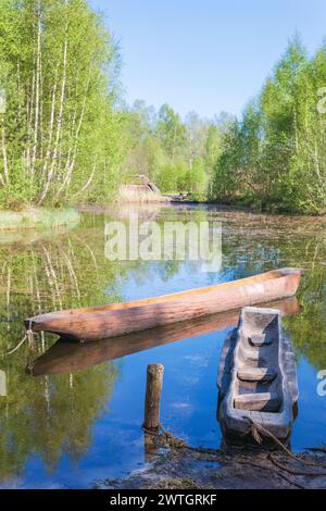 Dugout canoes on a lake Stock Photo