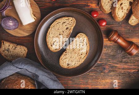 Freshly baked sourdough bread slices, top view Stock Photo