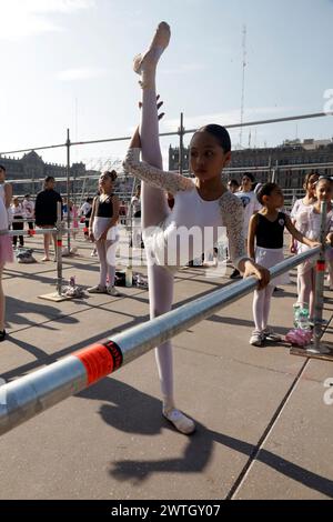 Mexico City, Mexico. 17th Mar, 2024. A girl is participating in the Staatsballett Berlin main dancer, Elisa Carrillo Cabrera's massive ballet class as part of the Women's Time: Festival for Equality in the Zocalo, in Mexico City, Mexico, on March 17, 2024. (Photo by Luis Barron/Eyepix Group) (Photo by Eyepix/NurPhoto) Credit: NurPhoto SRL/Alamy Live News Stock Photo
