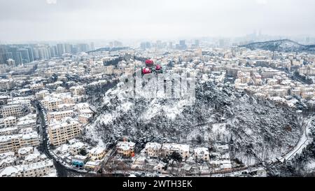 An Aerial shot of Qingdao City Snow Scene in Winter, China, Signal Hill Park Stock Photo