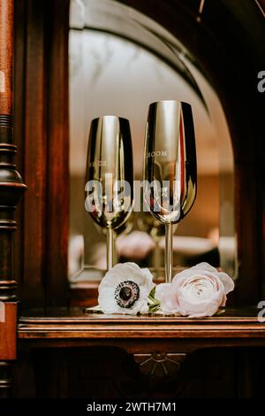 Gold metallic champagne stemware for wedding toasts Stock Photo