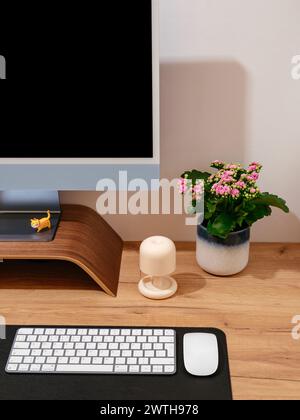 shot of table computer with mouse and keyboard on wooden table Stock Photo