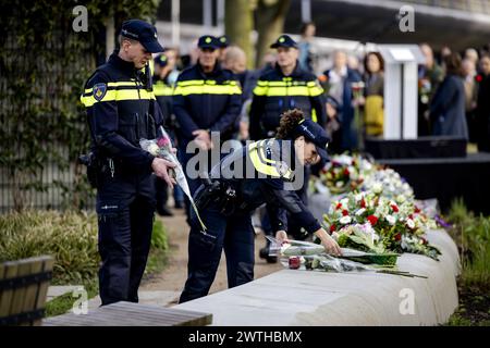 UTRECHT - Emergency workers lay flowers during the commemoration of the tram attack of March 18, 2019. Four people were killed and several people were injured when Gökmen T. opened fire in and around an express tram on 24 Oktoberplein. The commemoration will take place annually for the last time, from now on it will be commemorated every five years. ANP ROBIN VAN LONKHUIJSEN netherlands out - belgium out Stock Photo