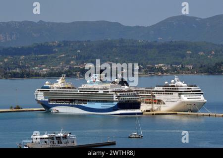 Greece, Island of Corfu, Kerkyra (Corfu town):  cruise liners 'Marella Explorer' of TUI, and 'MSC Lirika' of the Mediterranean Shipping Company at the Stock Photo